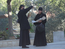 Two Russian Orthodox priests checking the merchandise they have just bought. Russian Monastery Gorney near Ein Karem, Jerusalem. By Ori229, CC BY-SA 3.0, https://commons.wikimedia.org/w/index.php?curid=1341731